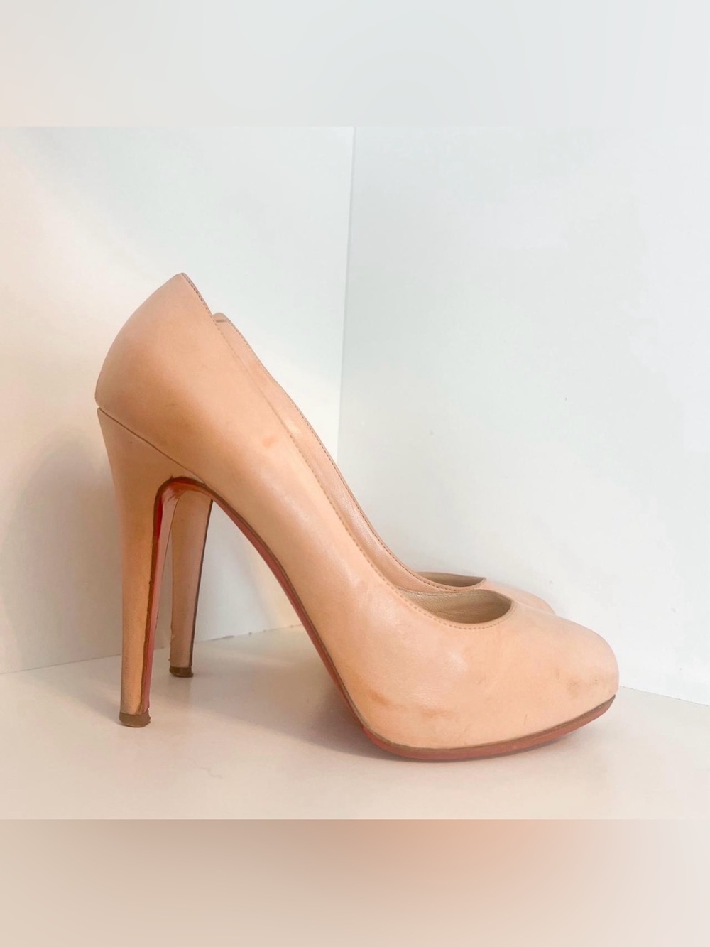 Christian Louboutin nude patent leather pumps